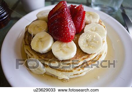 Fresh strawberry and banana pancakes View Large Photo Image Stock Image - Fresh strawberry and banana pancakes. Fotosearch