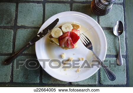 Stock Photography - Fresh strawberry and banana pancakes. Fotosearch