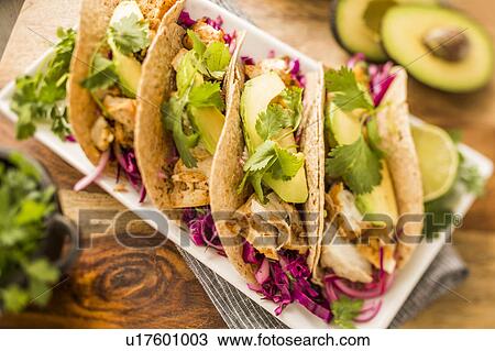 Stock Image - Fresh tortillas on plate. Fotosearch