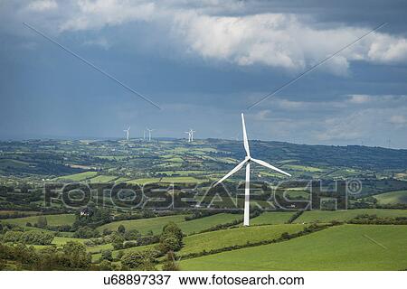 Stock Photo - Ireland, County Cavan, Landscape with wind turbines. Fotosearch