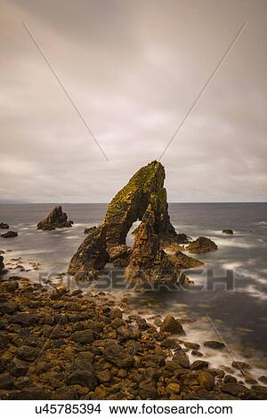 Ireland, County Donegal, Crophy Head rock formation in sea View Large Photo Image Picture - Ireland, County Donegal, Crophy Head rock formation in sea. Fotosearch