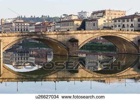 Italy, Tuscany, Florence, Cityscape reflected in Arno river View Large Photo Image Picture - Italy, Tuscany, Florence, Cityscape reflected in Arno river. Fotosearch