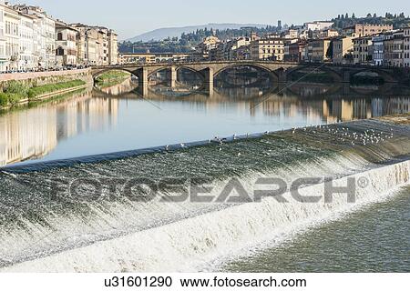 Italy, Tuscany, Florence, Cityscape reflected in Arno river View Large Photo Image Stock Image - Italy, Tuscany, Florence, Cityscape reflected in Arno river. Fotosearch
