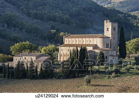 Italy, Tuscany, Montalcino, Abbey of Sant'Antimo near Montalcino in sunlight View Large Photo Image Picture - Italy, Tuscany, Montalcino, Abbey of Sant'Antimo near Montalcino in sunlight. Fotosearch