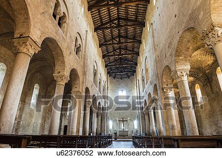 Stock Image - Italy, Tuscany, Montalcino, Interior of Abbey of Sant'Antimo. Fotosearch