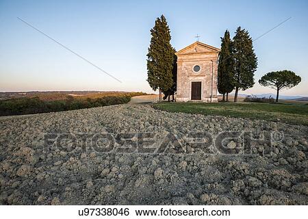 Italy, Tuscany, San Quirico D'orcia, Chapel at dusk View Large Photo Image Stock Photograph - Italy, Tuscany, San Quirico D'orcia, Chapel at dusk. Fotosearch