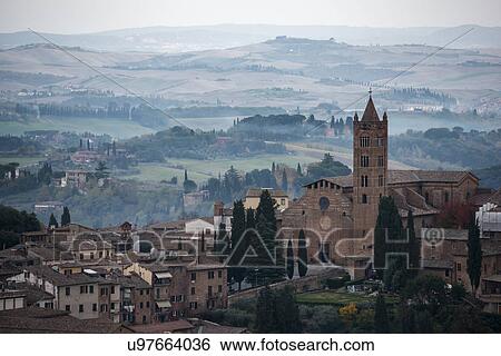 Italy, Tuscany, Siena, Evening view of Basilica of Saint Maria Dei Servi and beautiful hills behind View Large Photo Image Stock Photograph - Italy, Tuscany, Siena, Evening view of Basilica of Saint Maria Dei Servi and beautiful hills behind. Fotosearch