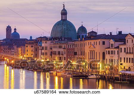 Italy, Veneto, Venice, Street light reflecting in water with Dome of Santa Maria della Salute Basilica View Large Photo Image Picture - Italy, Veneto, Venice, Street light reflecting in water with Dome of Santa Maria della Salute Basilica. Fotosearch