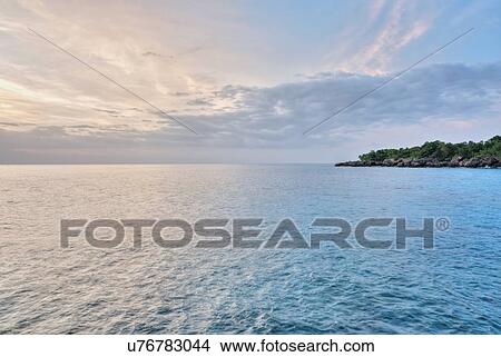 Picture - Jamaica, Negril, Tranquil seascape in sunset. Fotosearch