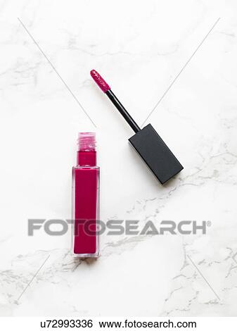 Lip gloss on marble background View Large Photo Image Stock Photograph - Lip gloss on marble background. Fotosearch