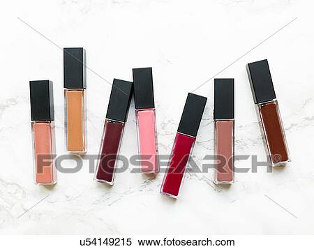 Lip glosses on marble background View Large Photo Image Stock Photography - Lip glosses on marble background. Fotosearch
