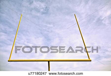 Stock Photo - Low angle view of american football goal post. Fotosearch