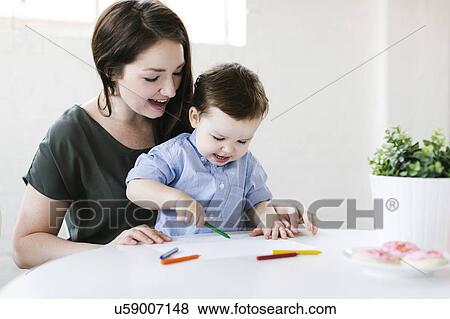 Mother drawing with son (4-5) View Large Photo Image Stock Photo - Mother drawing with son (4-5). Fotosearch