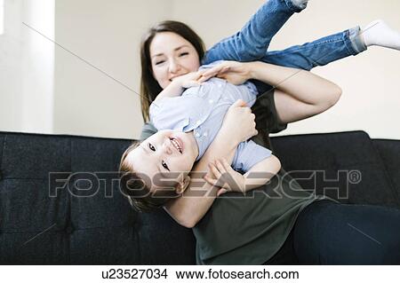 Mother playing with son (4-5) View Large Photo Image Picture - Mother playing with son (4-5). Fotosearch