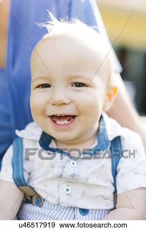 Mother with baby boy (12-17 months) View Large Photo Image Stock Photo - Mother with baby boy (12-17 months). Fotosearch