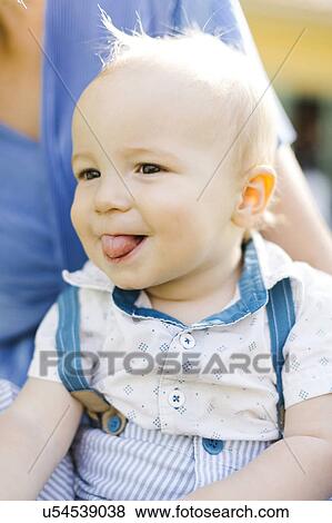 Mother with baby boy (12-17 months) View Large Photo Image Stock Photo - Mother with baby boy (12-17 months). Fotosearch