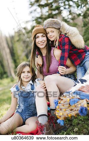 Mother with son (6-7) and daughter (8-9) camping in forest View Large Photo Image Stock Photo - Mother with son (6-7) and daughter (8-9) camping in forest. Fotosearch