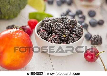 Nectarine and blackberries in bowl View Large Photo Image Stock Image - Nectarine and blackberries in bowl. Fotosearch