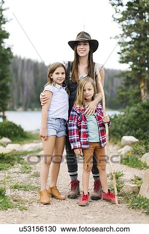 Outdoor portrait of mother with kids (6-7, 8-9) in forest View Large Photo Image Stock Image - Outdoor portrait of mother with kids (6-7, 8-9) in forest. Fotosearch