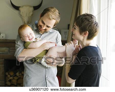 Parents with daughter (12-17 months) View Large Photo Image Stock Image - Parents with daughter (12-17 months). Fotosearch