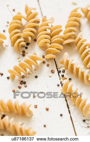 Stock Photo - Pasta and quinoa on white background. Fotosearch
