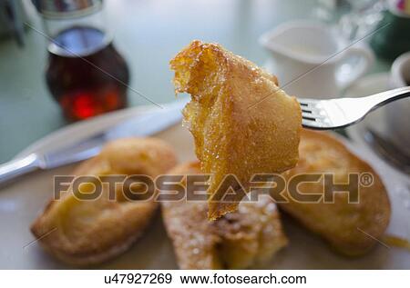 Piece of french toast on fork View Large Photo Image Stock Photo - Piece of french toast on fork. Fotosearch