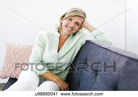 Stock Image - Portrait of comfortable Mature woman. Fotosearch