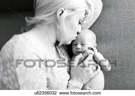 Portrait of newborn boy ( 0-1 months ) with mother View Large Photo Image Stock Image - Portrait of newborn boy ( 0-1 months ) with mother. Fotosearch