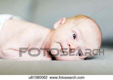 Stock Image - Portrait of one day Baby boy (0-1 months). Fotosearch
