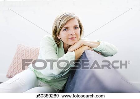 Stock Photo - Portrait of serene Mature woman. Fotosearch