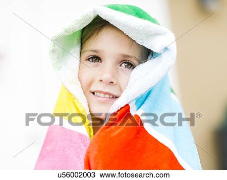 Portrait of smiling girl (4-5) in colorful towel View Large Photo Image Stock Image - Portrait of smiling girl (4-5) in colorful towel. Fotosearch