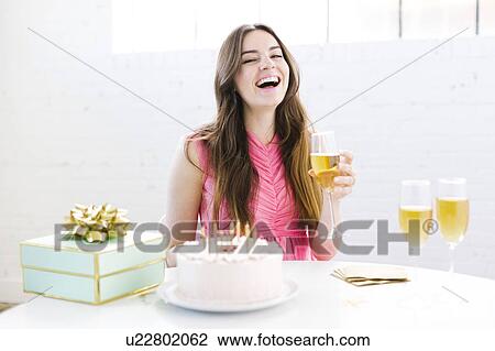 Portrait of woman at birthday party View Large Photo Image Stock Image - Portrait of woman at birthday party. Fotosearch