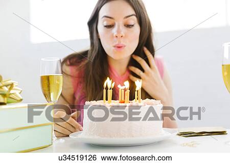 Portrait of woman at birthday party View Large Photo Image Stock Photograph - Portrait of woman at birthday party. Fotosearch