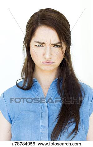 Portrait of woman making sad expression View Large Photo Image Stock Photograph - Portrait of woman making sad expression. Fotosearch