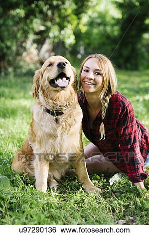 Portrait of woman with dog in nature View Large Photo Image Stock Photograph - Portrait of woman with dog in nature. Fotosearch