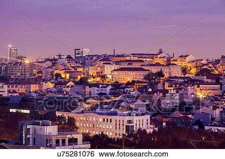 Stock Photograph - Portugal, Lisbon, Panorama of city at sunrise. Fotosearch