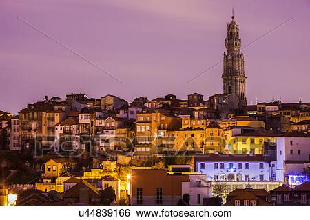 Stock Photograph - Portugal, Norte, Porto, Old Town of Porto with Clerigos Tower at sunrise. Fotosearch