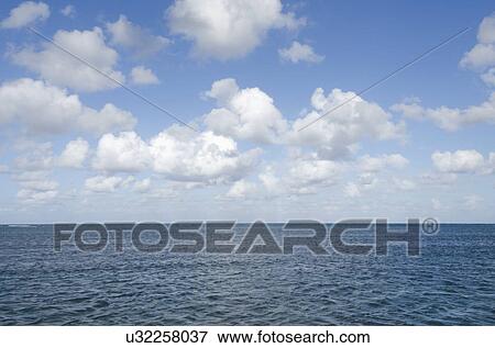 Stock Photo - Puerto Rico, Rio Grande, Puffy clouds over Atlantic Ocean. Fotosearch