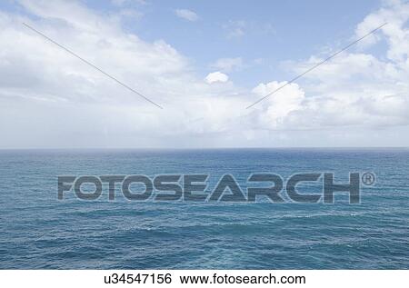 Stock Photograph - Puerto Rico, Rio Grande, Puffy clouds over Atlantic Ocean. Fotosearch