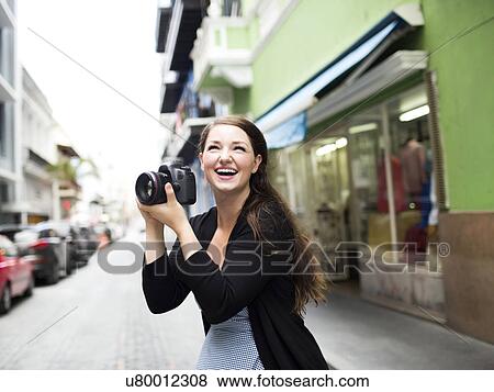 Puerto Rico, San Juan, Woman photographing on street View Large Photo Image Stock Photo - Puerto Rico, San Juan, Woman photographing on street. Fotosearch