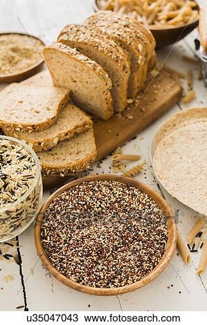 Stock Image - Quinoa and brown bread. Fotosearch