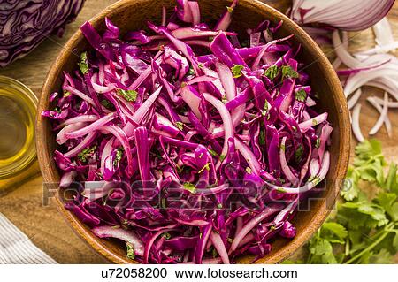 Stock Image - Red cabbage in bowl. Fotosearch