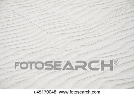 Stock Photo - Rippled sand in beach. Fotosearch