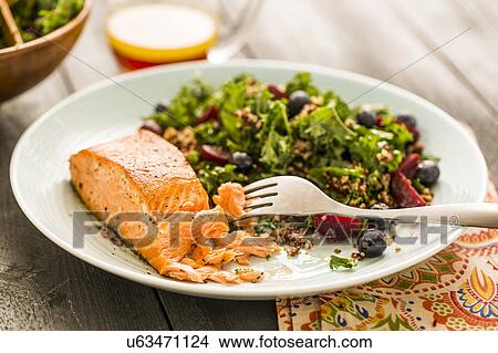 Salmon with salad on plate View Large Photo Image Picture - Salmon with salad on plate. Fotosearch