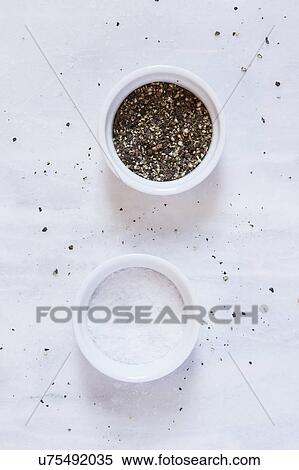 Salt and pepper on marble counter View Large Photo Image Stock Photography - Salt and pepper on marble counter. Fotosearch