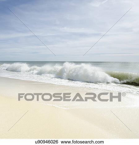 Sandy beach with waves View Large Photo Image Stock Photograph - Sandy beach with waves. Fotosearch