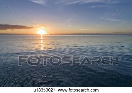 Sea at sunset View Large Photo Image Stock Photo - Sea at sunset. Fotosearch