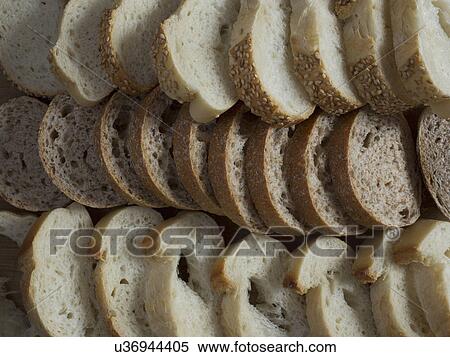 Slices of fresh bread View Large Photo Image Stock Photography - Slices of fresh bread. Fotosearch