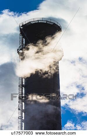 Smokestack releasing smoke View Large Photo Image Stock Image - Smokestack releasing smoke. Fotosearch