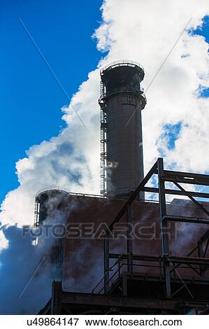 Smokestack releasing smoke View Large Photo Image Stock Photo - Smokestack releasing smoke. Fotosearch